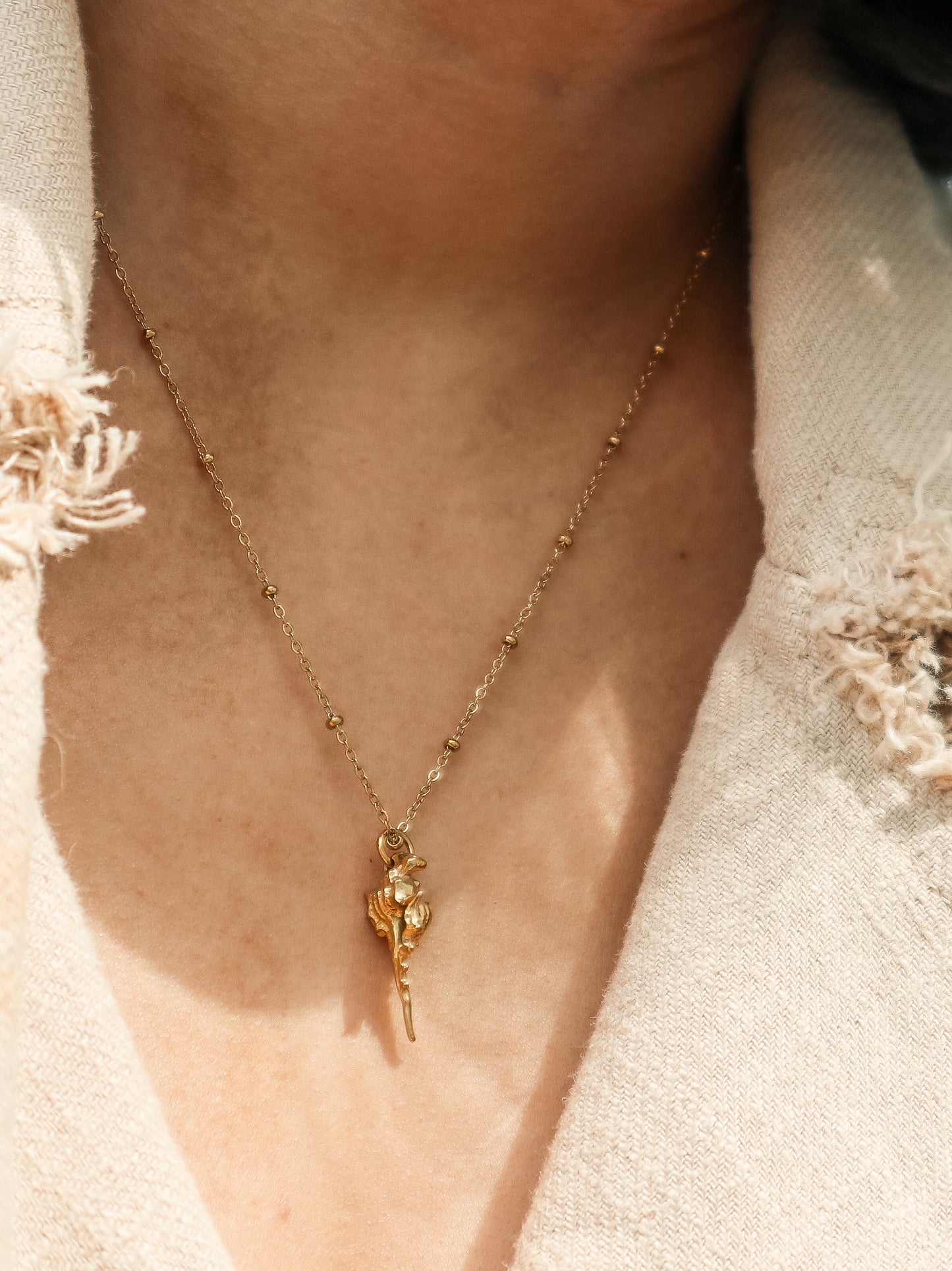 Gold Conch Shell Necklace